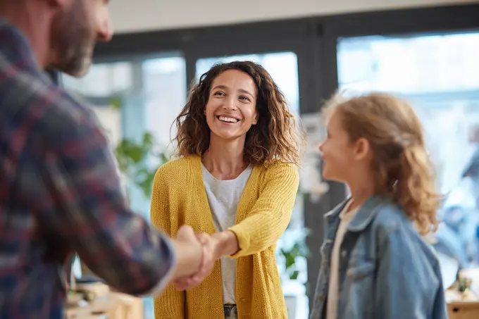 Parent and child scheduling a music lesson at Arrow Music Center